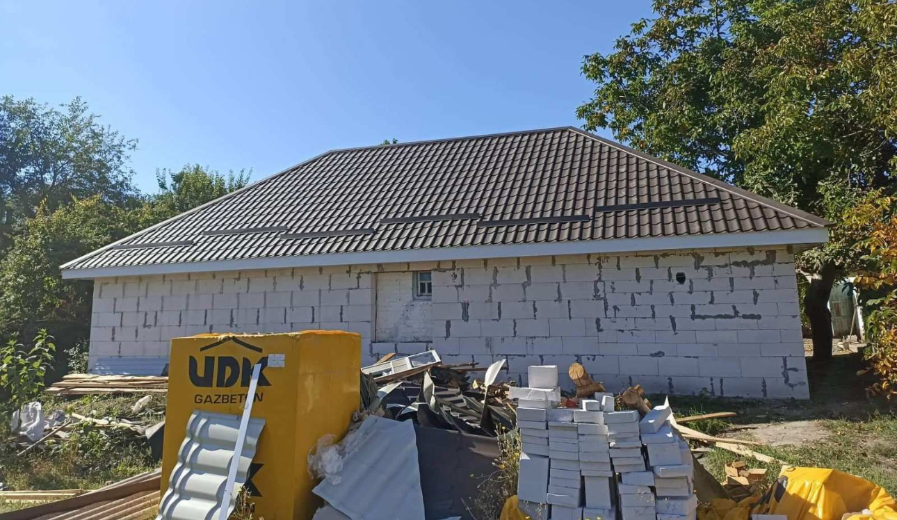 Вальмова покрівля, що поєднує естетику та функціональність